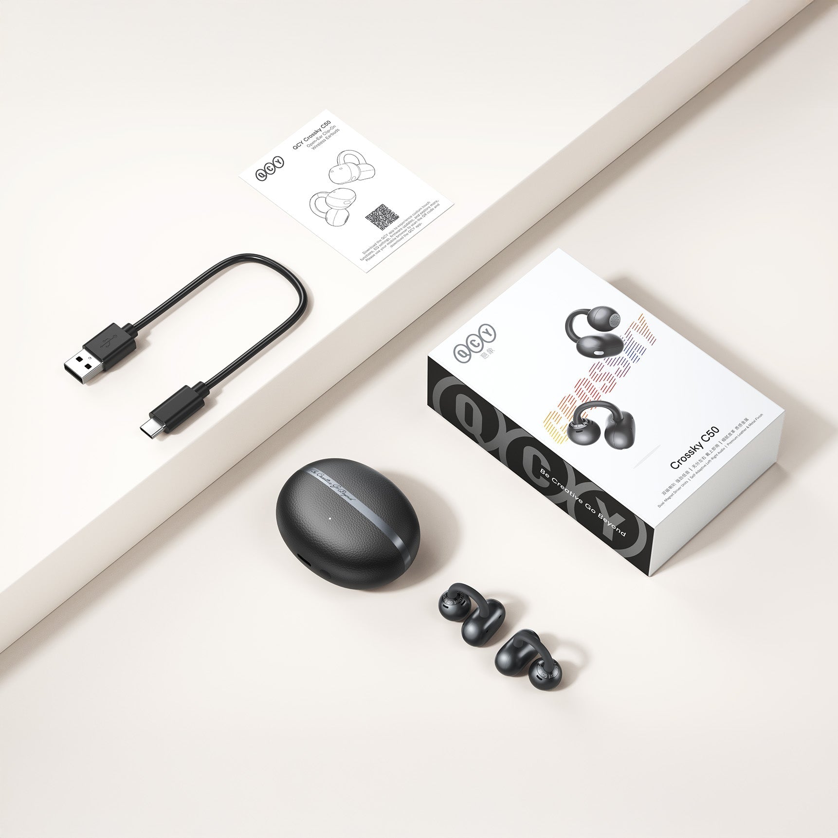 Fone de Ouvido QCY Crossky C50 sem fio, com estojo de carregamento preto, cabo USB-C e embalagem elegante.